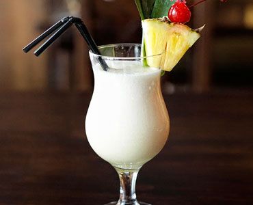 Pina Colada - Rum, Cream of Coconut or Coconut Milk, and Pineapple juice